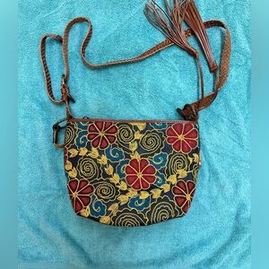 Patricia Nash crossbody. Beautiful colors. Leather. Adjustable strap. NWT